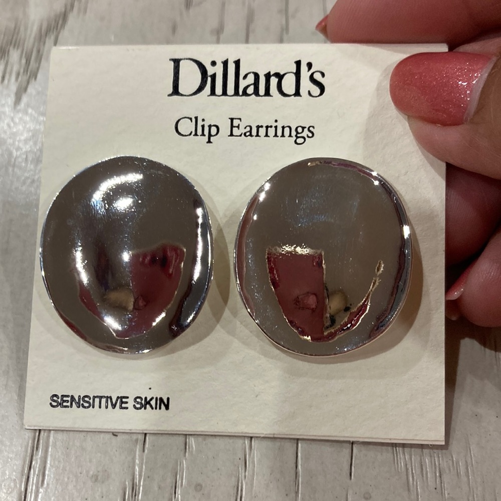 Silver Dillard’s clip earrings
